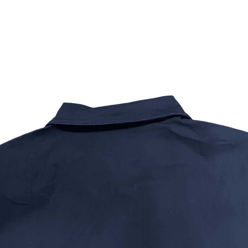 Close up of navy blue cotton men work shirt collar, pure cotton fabric texture detail