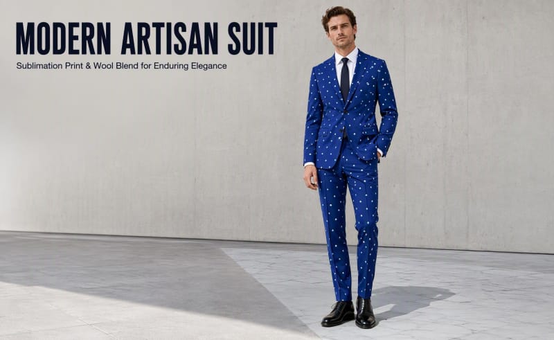Male model wearing Tensuit custom blue polka dot wool blend 2 piece suit, studio shot