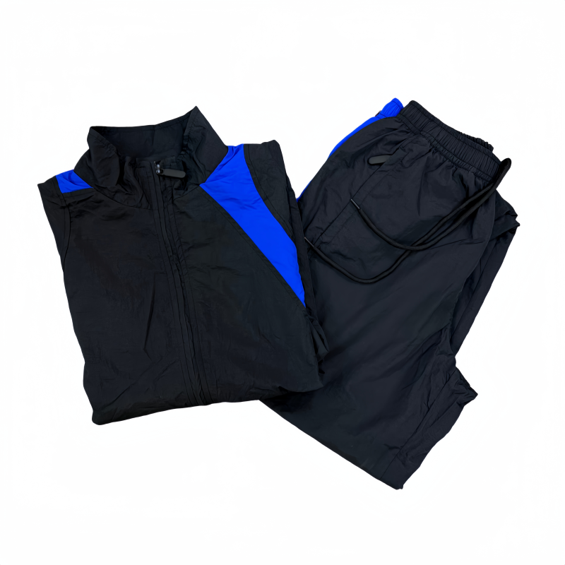 Tensuit black blue color block nylon tracksuit folded flat lay, 2 piece jacket and jogger pants set