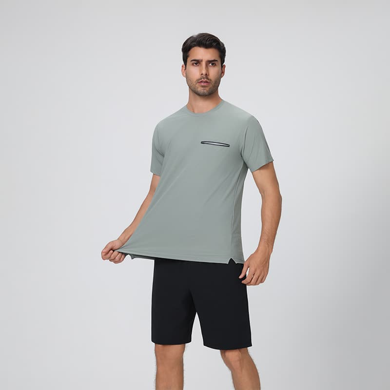 Male model wearing Tensuit P178 gray green quick dry athletic t-shirt front view