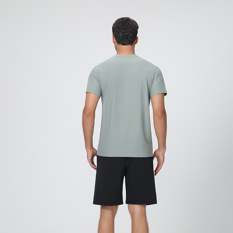Back view of male model wearing Tensuit P178 gray green quick dry sports t-shirt