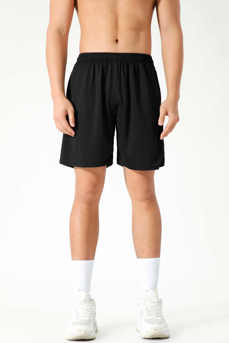 Male model wearing Tensuit black polyester athletic sports shorts front view